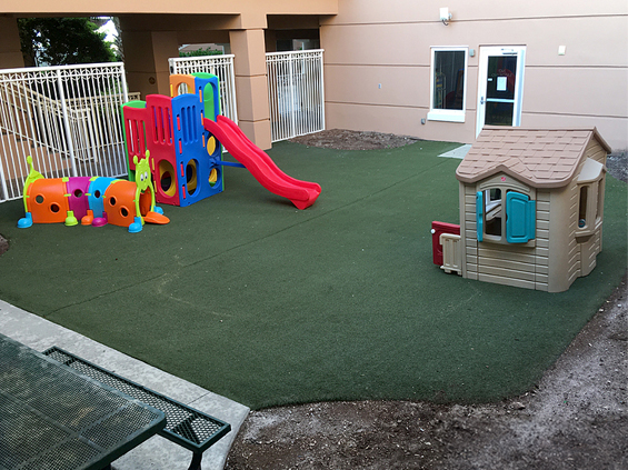 Small playground with old neglected turf