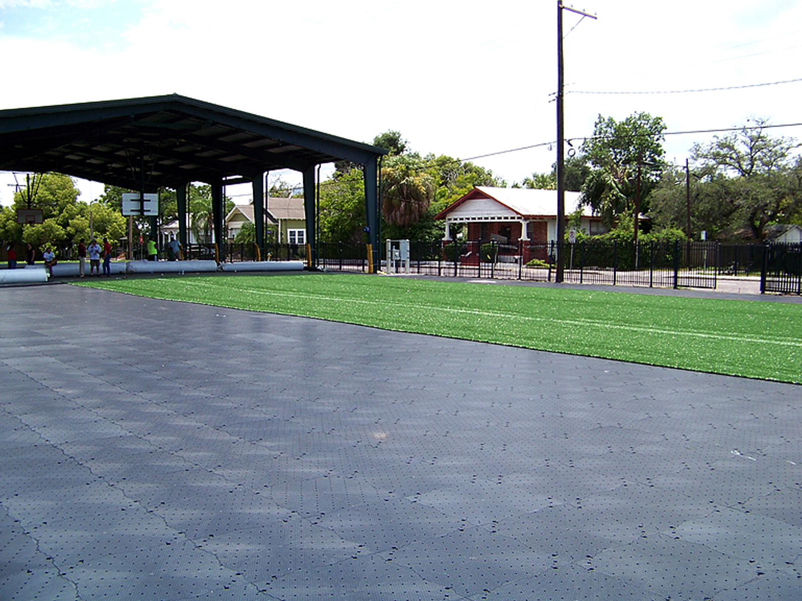 Turf being laid over Ultra Base System