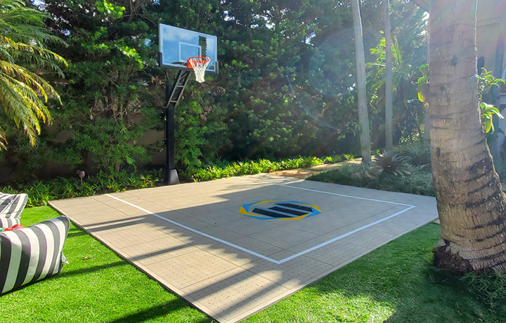 backyard basketball court with no concrete