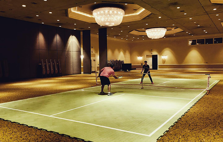 Ultra Base Portable pickleball court in ballroom