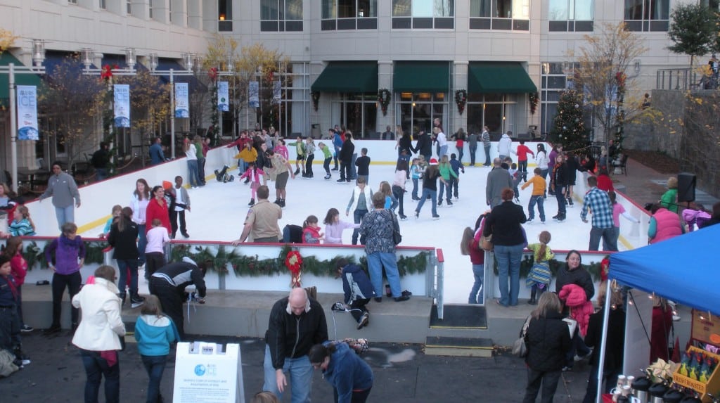 large crowd ice skating on downtown marriot ice rink