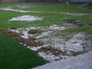 heavy rain flooded grass soccer field