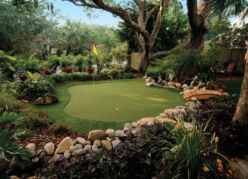 back yard putting green with landscape
