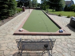home putting green and bacce ball area