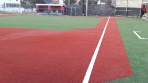completed red artificial turf baseball diamond