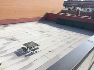 picnic table on empty rooftop