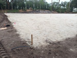 gravel base fill material for backyard soccer field installation