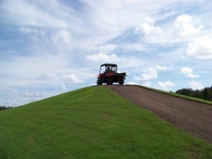 tractor on top of tee line hill