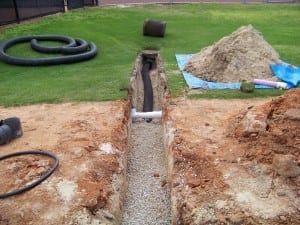 an installed drainage system for an artificial turf field