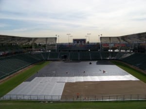 full view of connected and loose base panels on top of geosynthetic fabric for football field installation