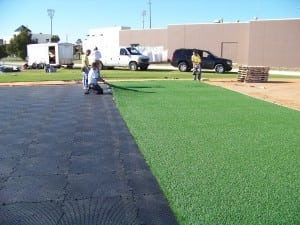 aligning artificial turf with markers made on base panel system