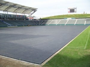 ground view of base panels installed on football field
