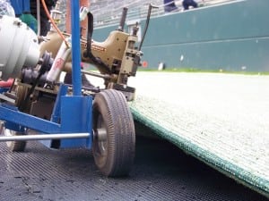 a carpet binder industrial machine seams pieces of turf together
