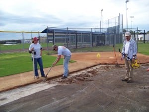 area for a base panel system is made on a baseball to artificial turf field