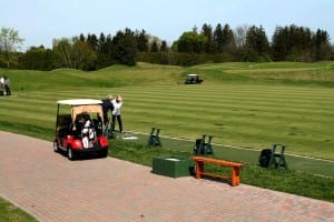 golfers playing on Beacon Hall Golf Club artificial turf tee line