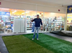 man standing on artificial turf