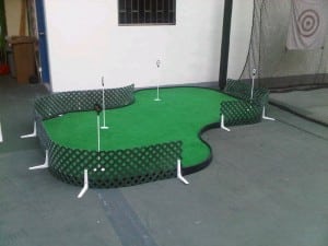 putting green with net in man cave