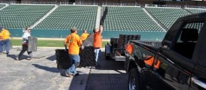 field installers removing and packing away base panels