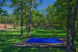 blue artificial putting turf installation for snag golf course