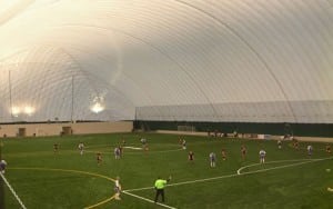 indoor soccer field with artificial turf