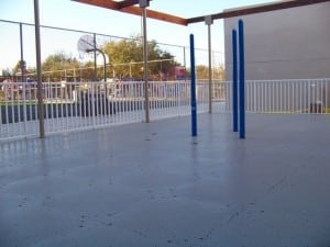playground panels connected around poles