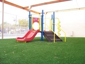 large view of artificial turf playground installation