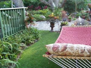 hammock in front of backyard paver installation