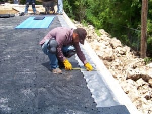 installer measures the remaining amount of space needed for ultrabasesystems panels