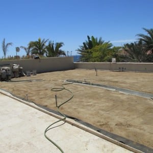 cleared area for rooftop putting green installation