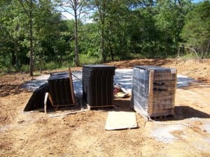 pallets of ultrabasesystems base panels at construction site