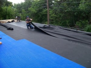 dave barlow laying fabric on top of ultrabasesystems panels
