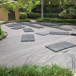 Lay down of base materials for artificial turf installation